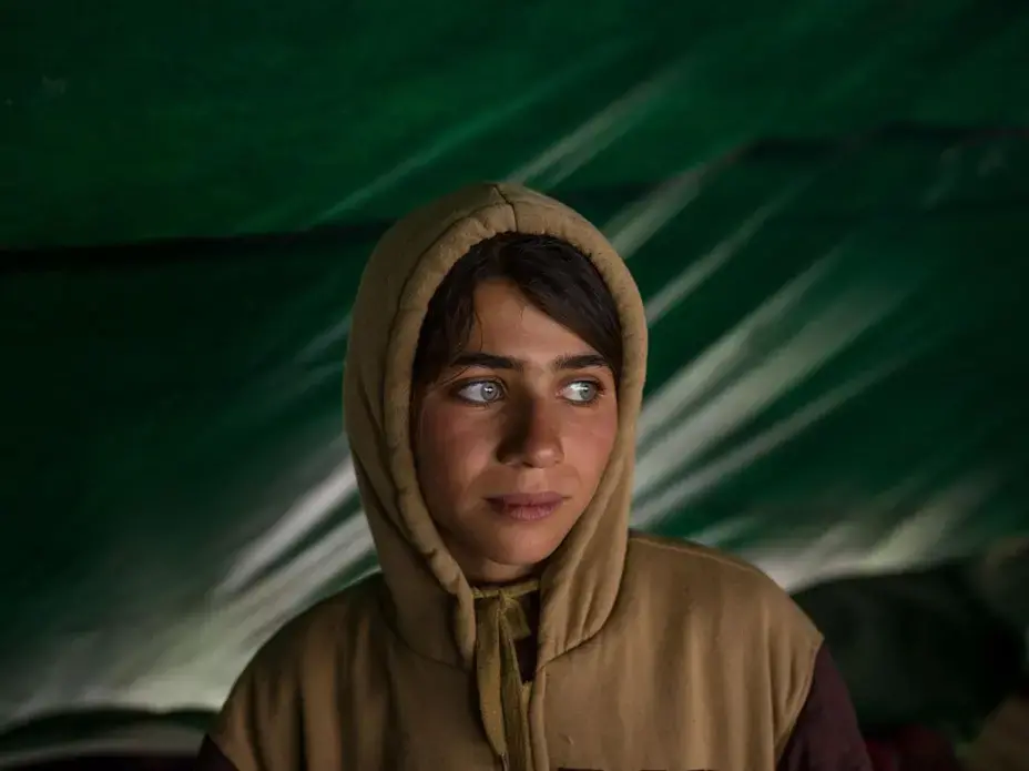 Mahshid Ghanbari, 12, was an excellent student when she was pulled out of school. Teachers asked her family to allow her to continue her studies. Mahshid’s mother doesn’t like having her daughter away from the family or in a classroom with a male teacher. Image by Newsha Tavakolian. Iran, 2018.