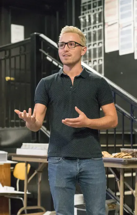Documentary filmmaker Stan Wright, who co-facilitated the Weaving Connections workshop with Diana Greene and acted as the film's Associate Producer, addresses the crowd at the film's premier. Image by Robert Merritt. United States, 2017.