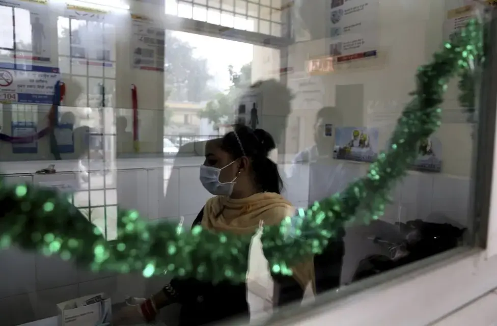 In this Thursday, Oct. 31, 2019, photo, a medic sits at a drug de-addiction center, where many cases of tramadol are reported, in Kapurthala, in the northern Indian state of Punjab. India scheduled tramadol in April 2018. But regulators acknowledge that the vastness of the pharmaceutical industry and the ingenuity of traffickers makes curtailing abuse and illegal exports all but impossible. Tramadol is still easy to find. Researchers estimate about 4 million Indians use heroin or other opioids, and a quarter of them live in the Punjab, India's agricultural heartland bordering Pakistan. Image by Channi Anand / AP Photo. India, 2019.