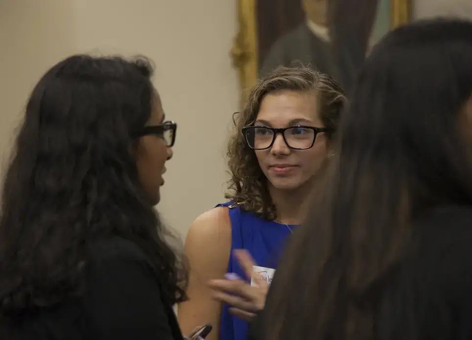Taylor Lord from High Point University discusses the effects of climate change on Chile's vineyards. Image by Jin Ding. Washington, DC, 2017.