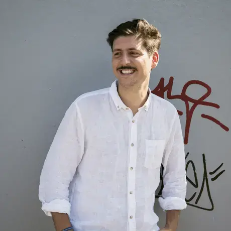 photo of man in a white button up