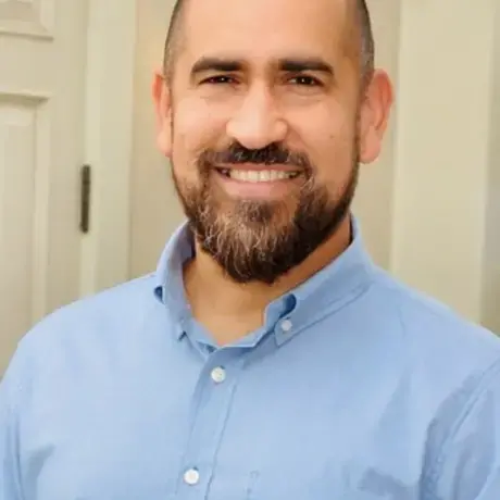 Headshot for Carlos Santini.