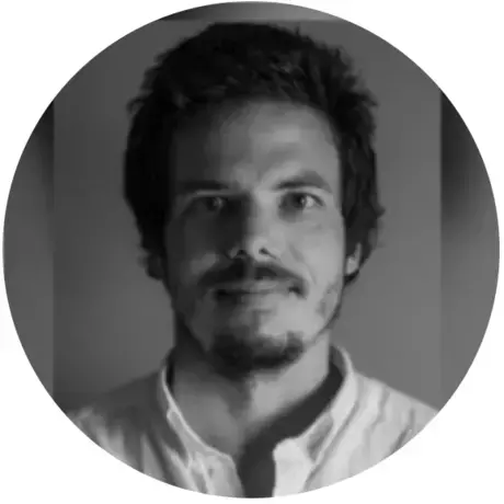 Avener Prado.png A man stares into the camera
