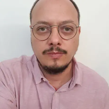 man stares at camera