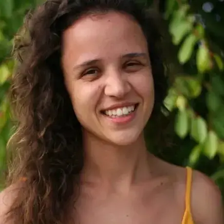 Alice-Maciel.jpg A WOMAN SMILES INTO THE CAMERA