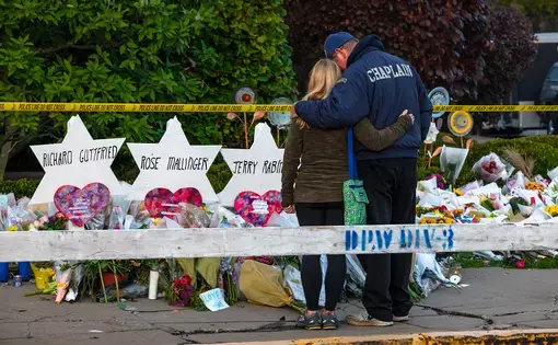 Chaplain Bob Ossler of Cape Coral FL comforts members of the community outside of the Tree of Life synagogue in Pittsburgh. Image by Brendt A Petersen / Shutterstock.com. United States, 2018.