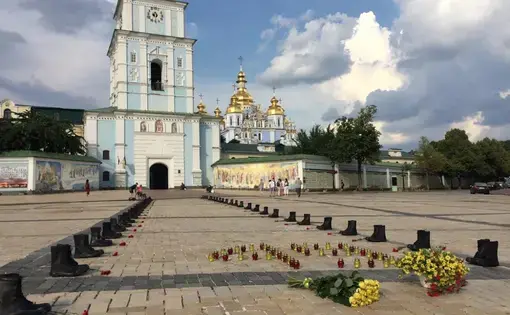 A display in front of St. Sophia’s Cathedral commemorates the loss of 40 troops and 9 crew members on June 14, 2014, when a transport plane was shot down in Luhansk. Image by Taylor Damann. Ukraine, 2019.