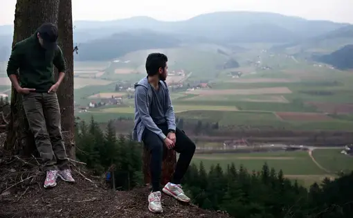 Rafat and Naif on the overlook in the Black Forest near Zell am Hammersbach, Germany. Image by Holly Pickett. Germany, 2014.