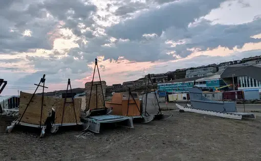 Qamutiks (Inuit sleds) lined up outside Iqaluit’s high school. Image by Julie De Meulemeester. Canada, 2018.