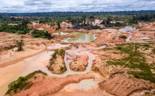 Aerial view of deforested area of the Amazon rainforest caused by illegal mining activities in Brazil. Image courtesy of Shutterstock. Brazil, date unknown.