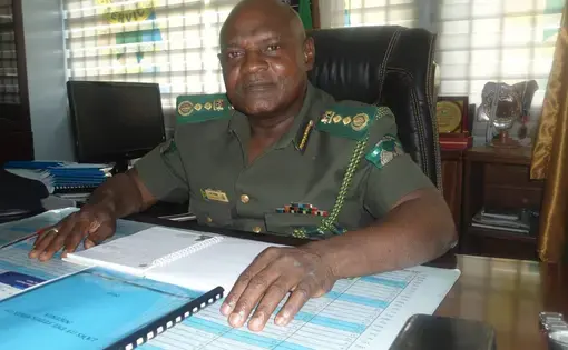 Ibrahim Musa sitting at a desk