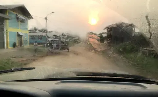Sun and rain through windshield