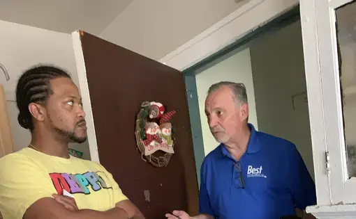 Landlord talking to tenant