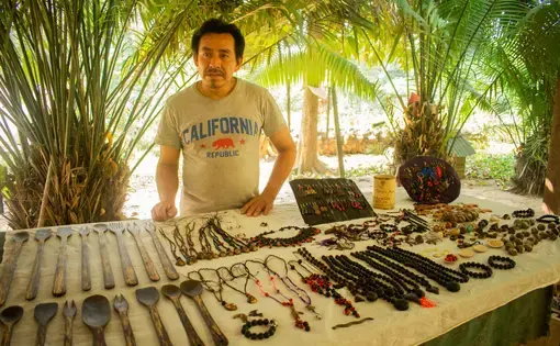 A man sells souvenirs.