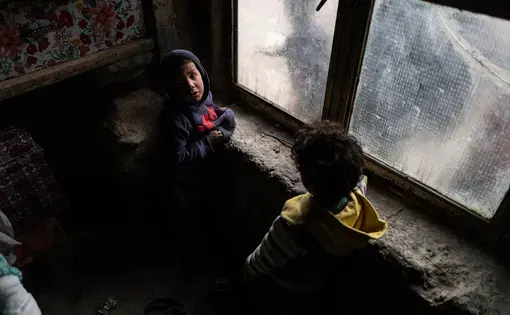 Young boy looks up