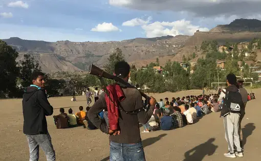 A man stands with a gun, Ethiopia