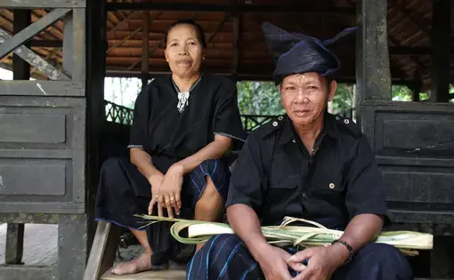 A Kajang couple after attending Andingingi, an annual ritual to ask the forest for forgiveness for humanity’s sins. (Peter Yeung for The Washington Post)