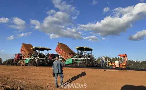 A man walks to a construction site.