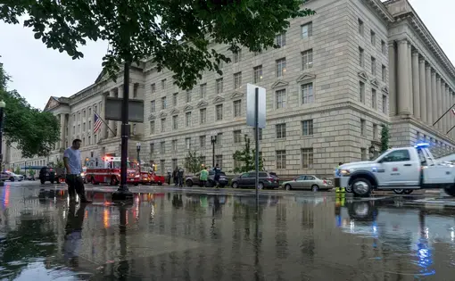 Washington, DC / USA - July 8, 2019: Torrential rain flooded parts of Washington, DC, stranding cars and causing havoc with traffic.