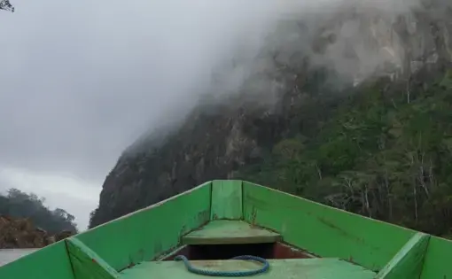 a boat on a river in the Ecuador amazon