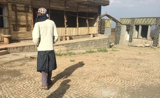 A man walking, viewed from behind