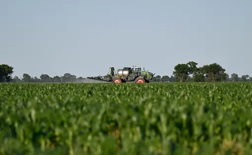 Tractor crossing field