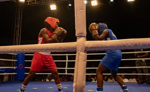 female boxers fighting in a boxing ring