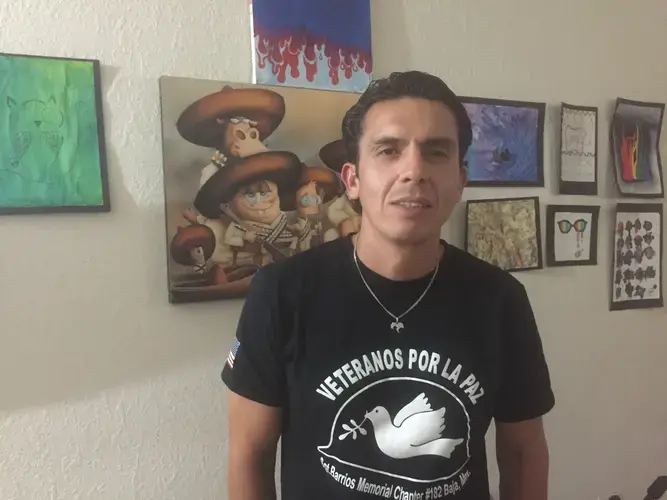 Deported veteran Alex Murillo inside his apartment in Ensenada, Mexico.Ensenada, Mexico, 2019. Image by Maria Ines Zamudio.<br />
