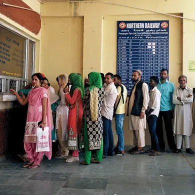 The ticket line for trains at the Baramulla station. Image by Sara Hylton. Kashmir, 2017.<br />
