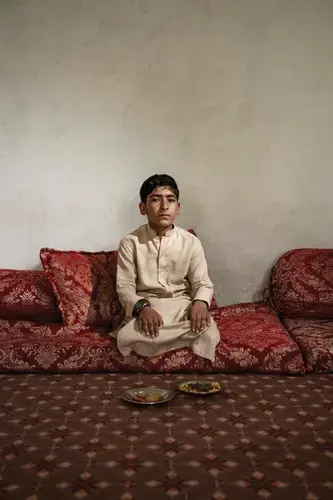 Haroon, age twelve, witnessed a Zero-Two raid on his family home. He was the oldest male survivor. Image by Adam Ferguson. Afghanistan, 2019.