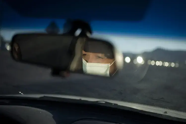Norma Flores drives to a grocery store near her home in Henderson, Nev., Tuesday, Nov. 10, 2020.&nbsp;Image by Wong Maye-E / AP Photo. United States, 2020.