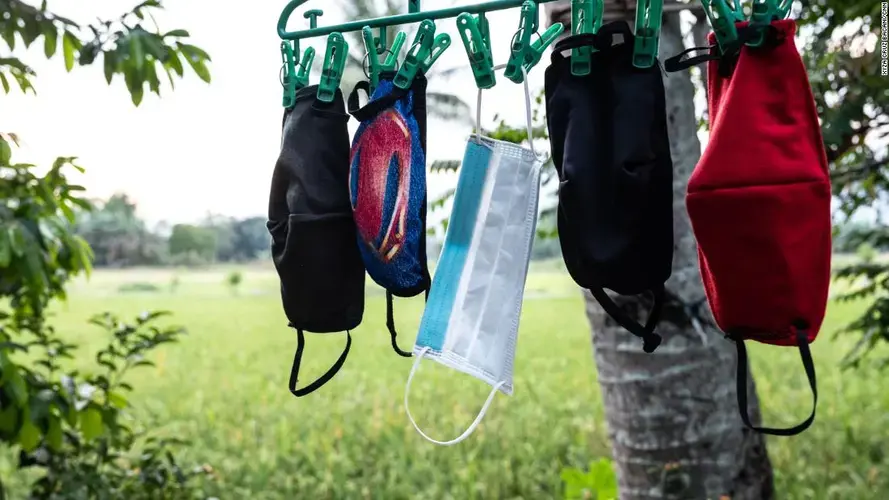 April Abrias' facemasks are hung out to dry after being washed so they can be reused.&nbsp;Image by Xyza Cruz Bacani. Philippines, 2020.