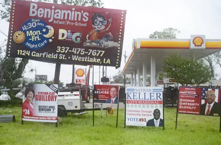 Campaign signs line the streets in Lake Charles, Louisiana. Image by Katie Sikora. United States, 2020.