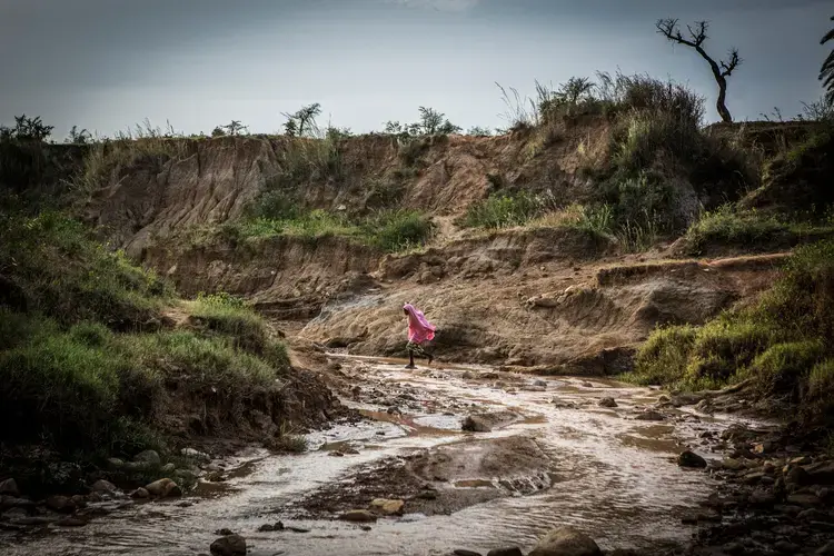 A stream near Nghar Village in Nigeria’s Gashish District, where more than 200 people were killed in June by men thought to be cattle herders. Those killed were part of the farming community, which uses land the herders covet. Image by Jane Hahn. Nigeria, 2018.