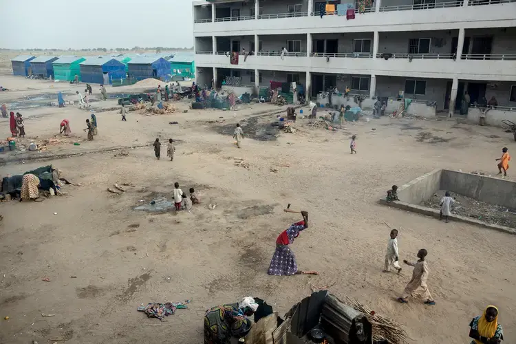 Custom House, a camp on the outskirts of Maiduguri, Nigeria, for people displaced by the conflict with Boko Haram, has more than 9,000 residents. Image by Glenna Gordon. Nigeria, 2017. 