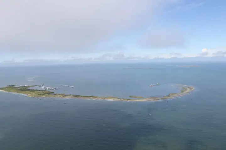 East Timbalier Island shrinks by about 70 feet per year. It protects Port Fourchon and Terrebonne Bay from hurricanes and storm surges. Image courtesy of NOLA.com | The Times-Picayune. United States, 2019.