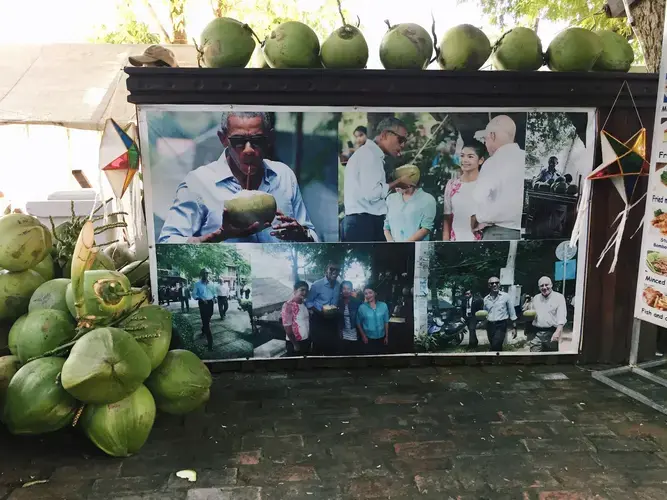 The coconut stand where President Obama quenched his thirst in August 2016. Image by Erin McGoff. Laos, 2017.