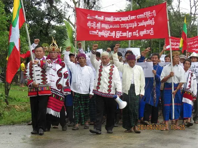 Rawang Literature and Culture Association chairman Marip Yaw Shu (second from left) leads a demonstration in Putao in 2017 against the proposal to nominate the Hkakabo Razi Landscape for World Heritage status. Image by anonymous. Myanmar, 2017.