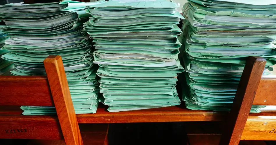 Piles of boxes contain folders of mostly unpaid fines for deforestation violations, Selva says. Image by Sam Eaton. Brazil, 2018.
