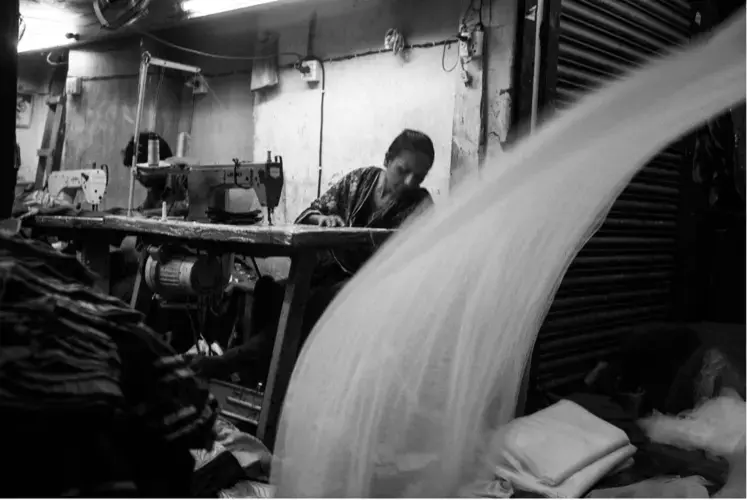 A garment worker in Dhaka, Bangladesh. Image by Jošt Franko. Bangladesh, 2016.&nbsp;