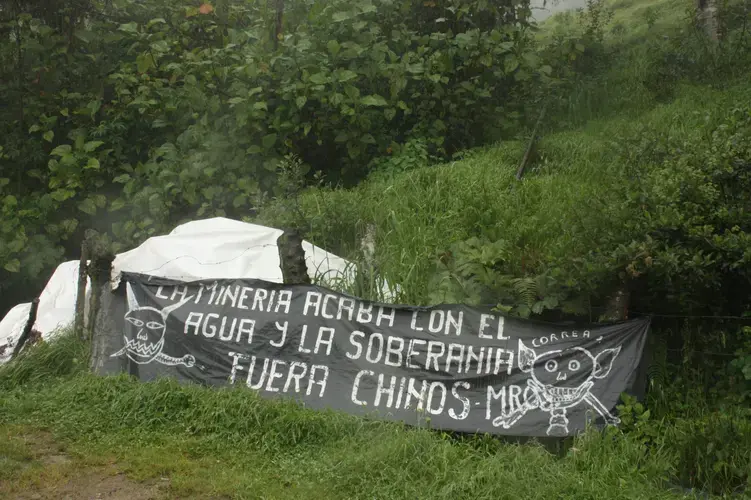 At the entrance in Yumate there is a banner exhorting Chinese companies to leave the area. Image by Andrés Bermúdez Liévano. Ecuador, 2019.