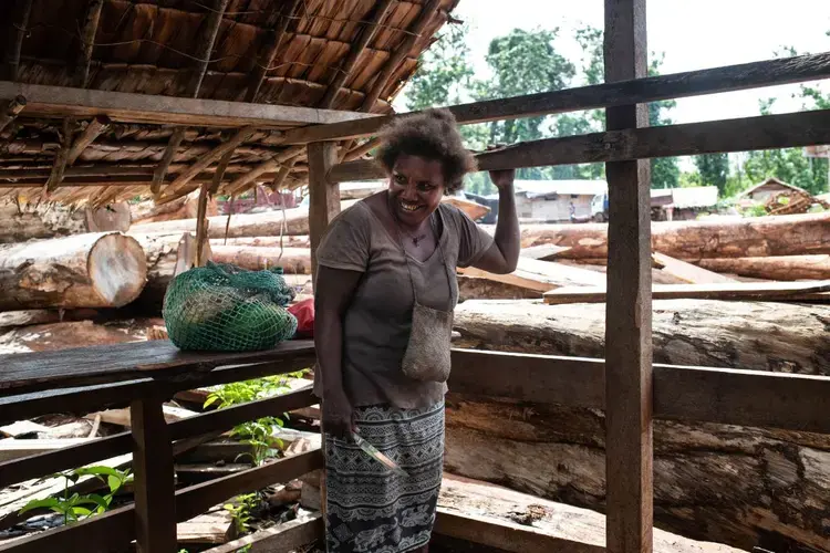Florence Arukwai, 42, one of the female rangers, waits to go to the hut she and the other women have built on the perimeter of Igwa village on the island of Malaita, Solomon Islands, on September 18t, 2019. Image by Thomson Reuters Foundation/Monique Jaques. Solomon Islands, 2019.