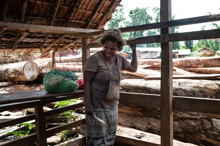 Florence Arukwai, 42, one of the female rangers, waits to go to the hut she and the other women have built on the perimeter of Igwa village on the island of Malaita, Solomon Islands, on September 18t, 2019. Image by Thomson Reuters Foundation/Monique Jaques. Solomon Islands, 2019.
