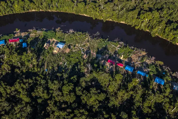 Urarina village called Nueva Unión lies on the Chambira River, which runs through vast peatlands in Peru’s Pastaza-Marañón Foreland basin. Image by Dado Galdieri. Peru, undated.
