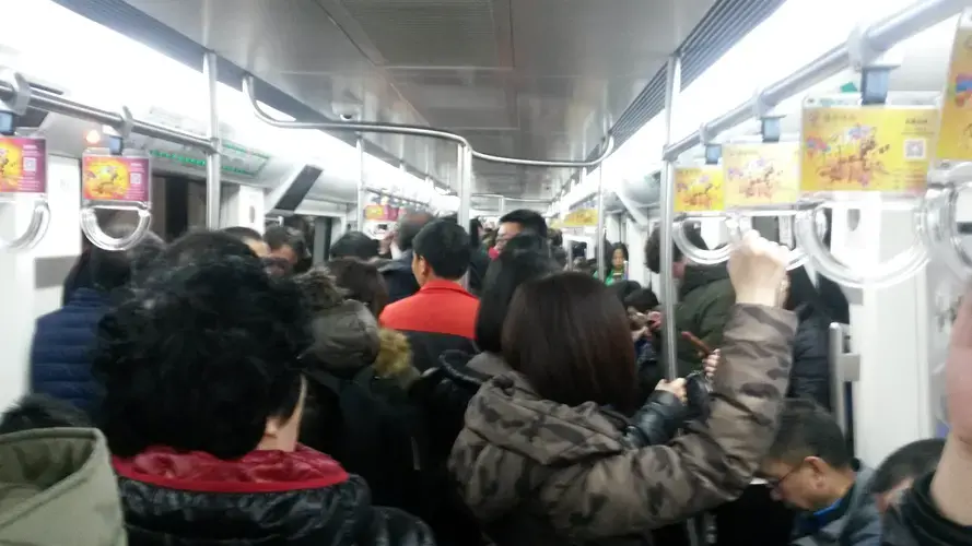 Beijing’s crowded, fast-growing subway system is a symbol of the breakneck economic growth that, in addition to lifting hundreds of millions of people from poverty, has also left China with polluted air, tainted water, and poisoned soil.&nbsp;Image by Beth Gardiner. China, 2017.