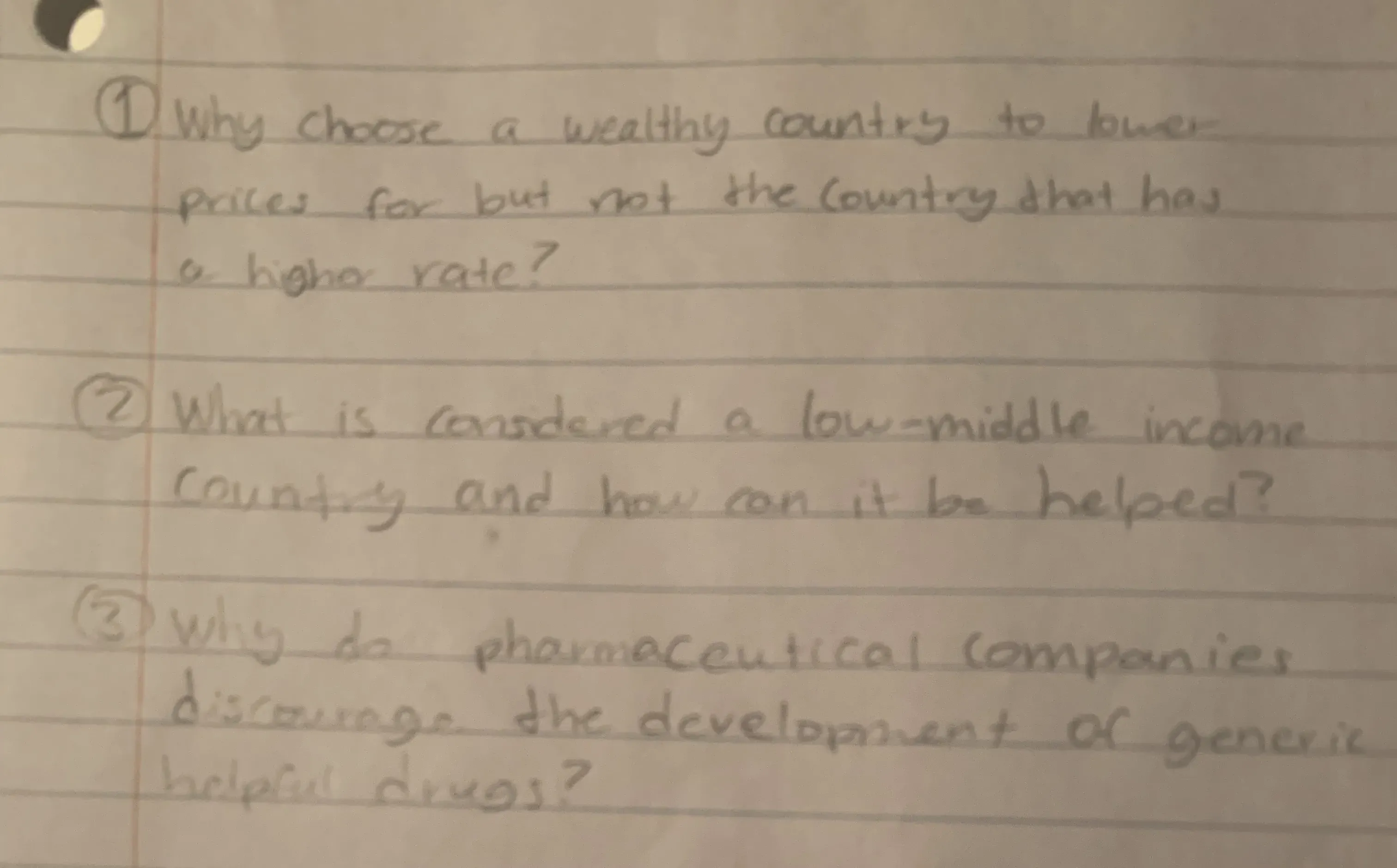 list of three student questions handwritten in pencil on ruled paper