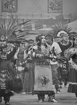 a photo of woodburn student, Quetzalli presenting with her group of Danza Azteca at the Yakima National Indian Reservation.