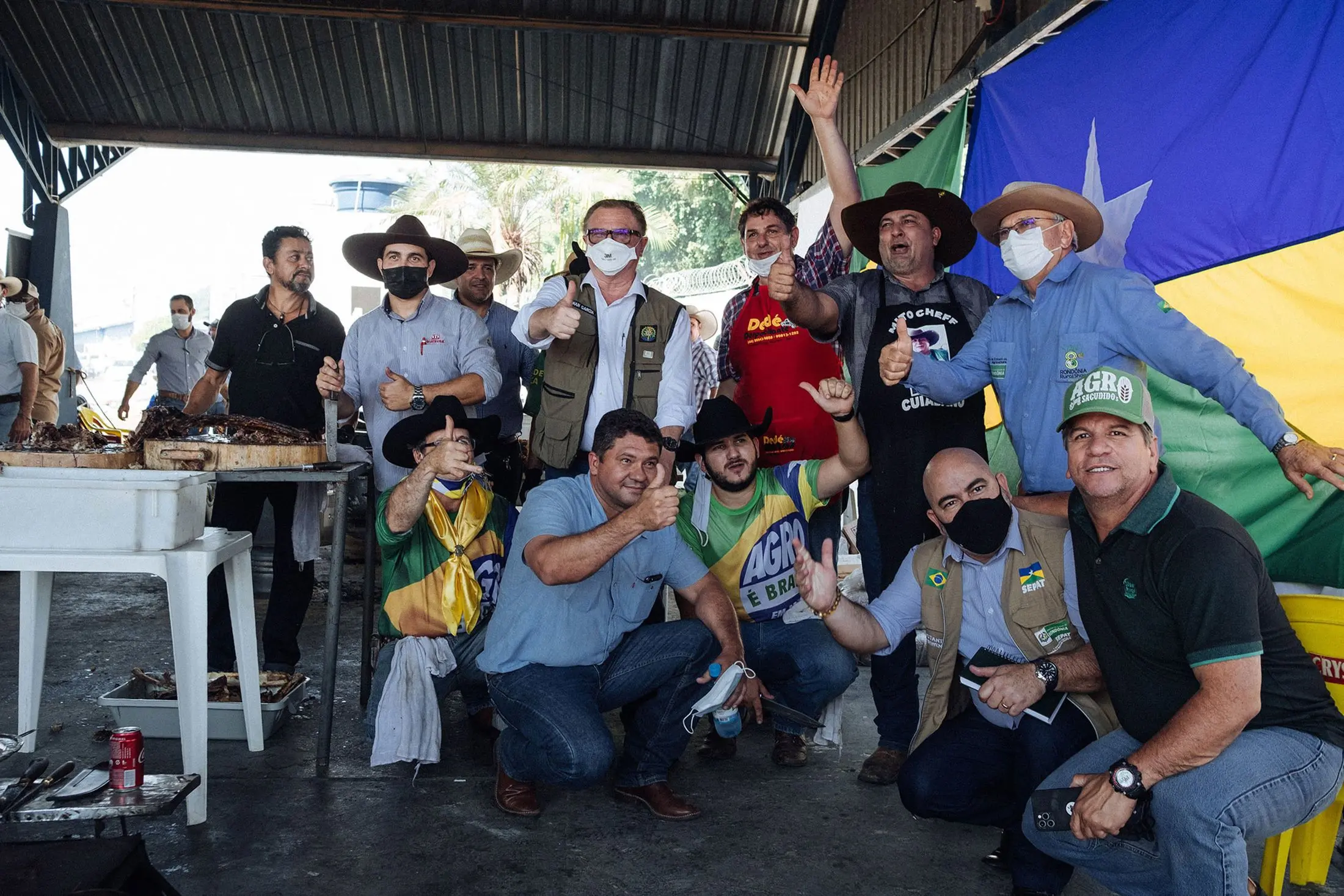 Ranchers and farmers pose together at an event