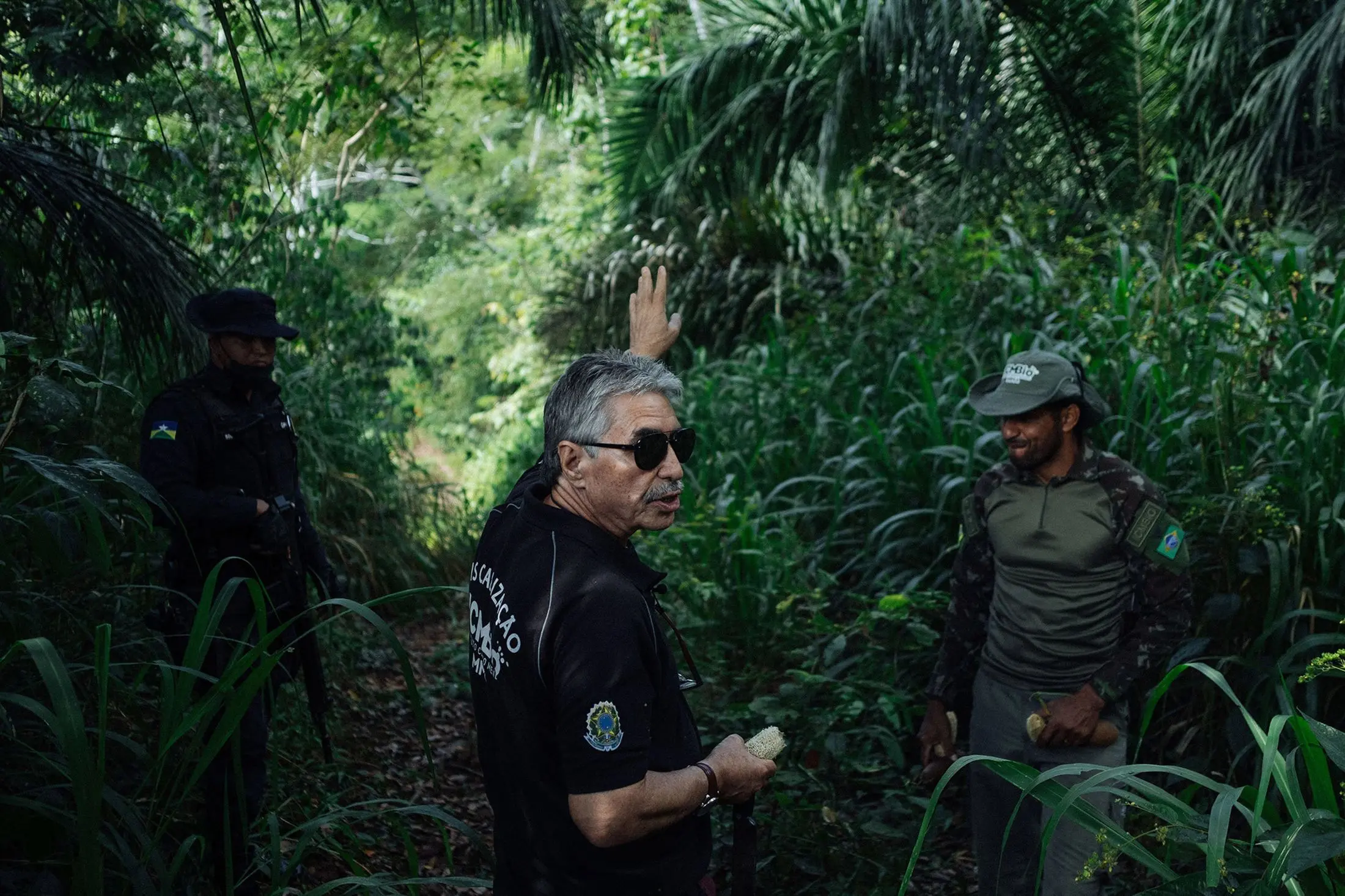 A man patrols area of rainforest