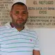 Ex-police officer Pedro Gonzalez Diaz standing outside of Fundación Hoasis, where he has lived for the past year. Image by Patrick Ammerman. Colombia, 2019.